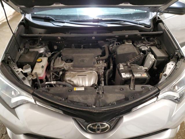 2T3BFREV2HW652870 - 2017 TOYOTA RAV4 LE SILVER photo 12