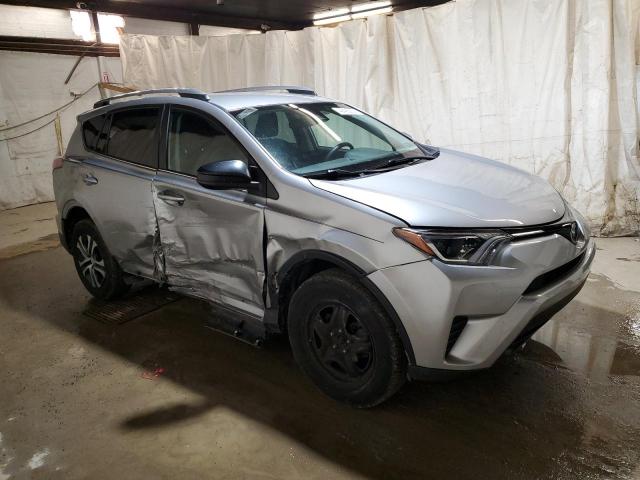 2T3BFREV2HW652870 - 2017 TOYOTA RAV4 LE SILVER photo 4