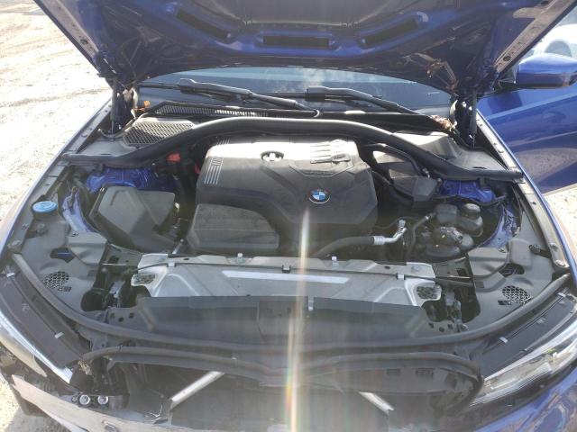 WBA5R7C59KAJ81654 - 2019 BMW 330XI Blau Foto 11