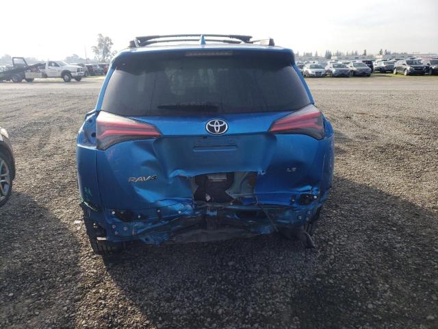 JTMZFREV7HJ704572 - 2017 TOYOTA RAV4 LE BLUE photo 6