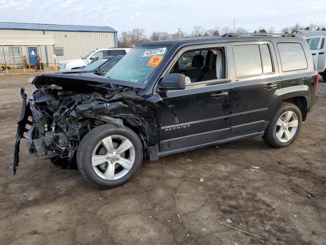 1C4NJRFB2ED549537 - 2014 JEEP PATRIOT LATITUDE BLACK photo 1