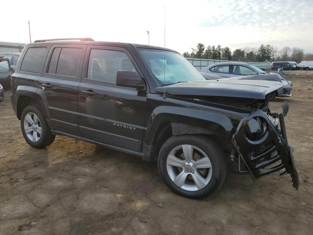 1C4NJRFB2ED549537 - 2014 JEEP PATRIOT LATITUDE BLACK photo 4