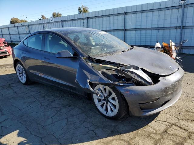 5YJ3E1EA6PF671089 - 2023 TESLA MODEL 3 BLACK photo 4