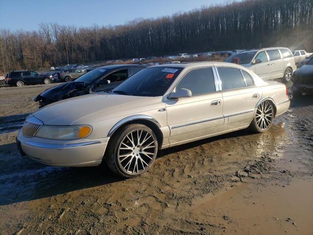 1LNHM97VXXY637594 - 1999 LINCOLN CONTINENTA CREAM photo 1