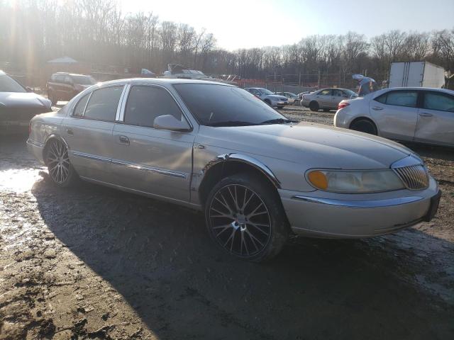 1LNHM97VXXY637594 - 1999 LINCOLN CONTINENTA CREAM photo 4