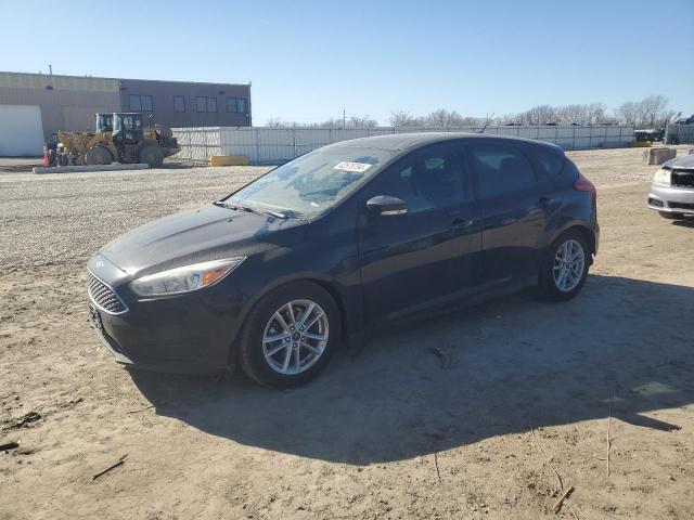 1FADP3KE7GL210648 - 2016 FORD FOCUS SE BLACK photo 1