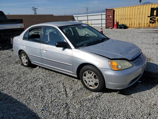 2HGES16692H557751 - 2002 HONDA CIVIC LX SILVER photo 4