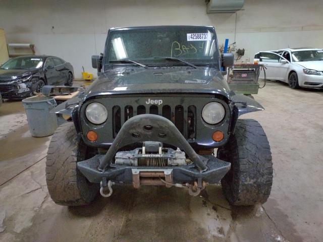 1C4BJWEG8CL179275 - 2012 JEEP WRANGLER U SAHARA BLACK photo 5