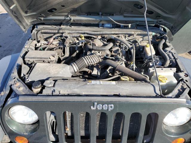 1J4HA3H1XAL205222 - 2010 JEEP WRANGLER U SPORT მწვანე ფოტო 11
