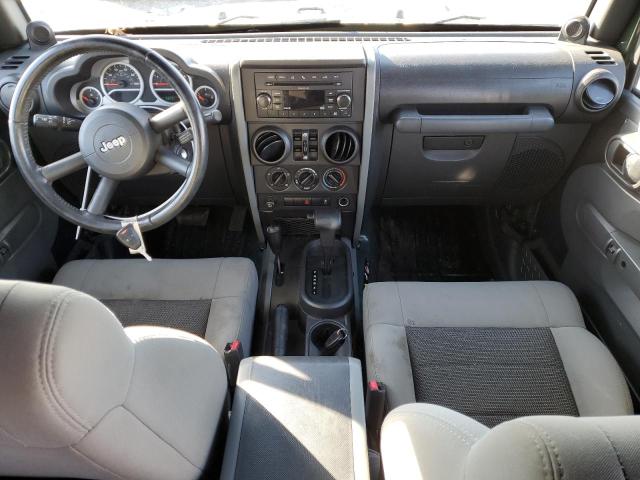 1J4HA3H1XAL205222 - 2010 JEEP WRANGLER U SPORT მწვანე ფოტო 8