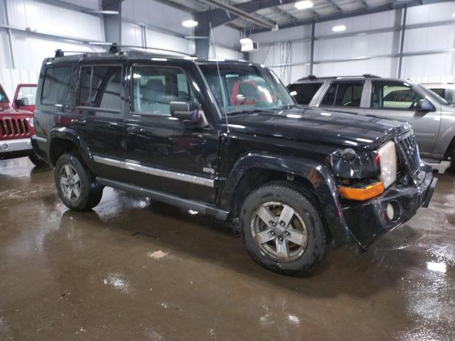 1J8HG48KX6C354619 - 2006 JEEP COMMANDER BLACK photo 4