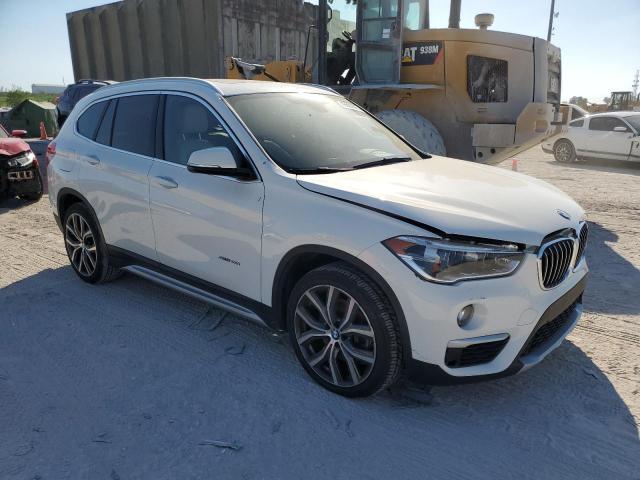 WBXHU7C30H5H38729 - 2017 BMW X1 SDRIVE28I WHITE photo 4