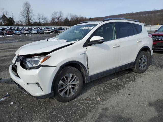 JTMRJREV4JD239090 - 2018 TOYOTA RAV4 HV LE WHITE photo 1