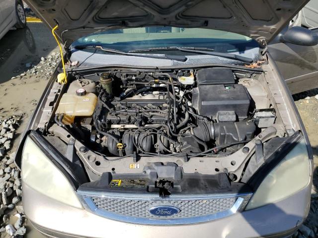 1FAFP34N05W206149 - 2005 FORD FOCUS ZX4 GOLD photo 11