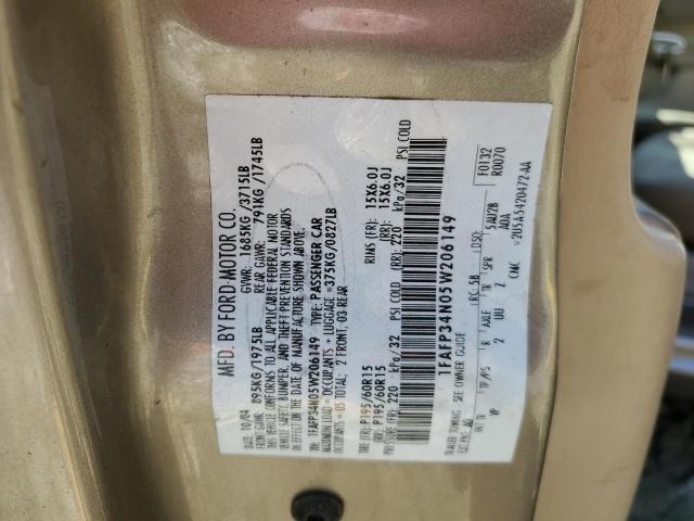 1FAFP34N05W206149 - 2005 FORD FOCUS ZX4 GOLD photo 12