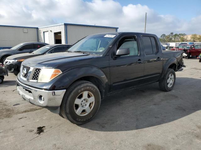 1N6AD07U26C403953 - 2006 NISSAN FRONTIER CREW CAB LE BLACK photo 1