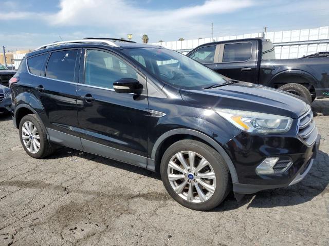 1FMCU0J9XHUB81283 - 2017 FORD ESCAPE TITANIUM BLACK photo 4