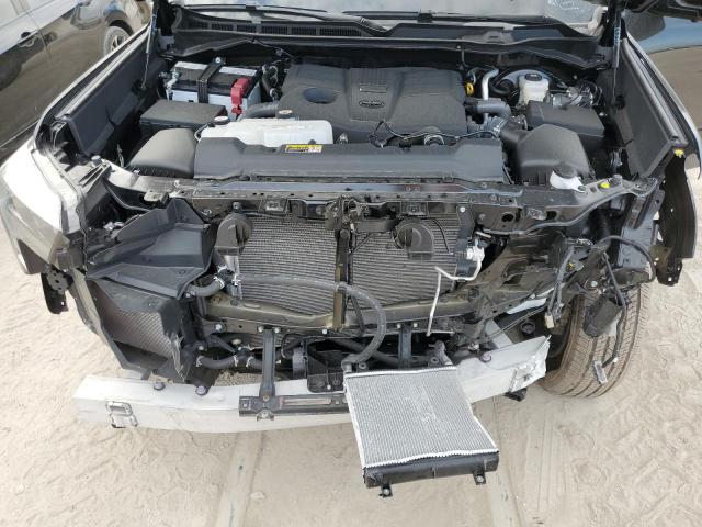 5TFNA5AB7PX021428 - 2023 TOYOTA TUNDRA CREWMAX PLATINUM Schwarz Foto 11
