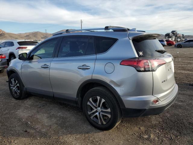 JTMZFREV9JJ181643 - 2018 TOYOTA RAV4 LE SILVER photo 2