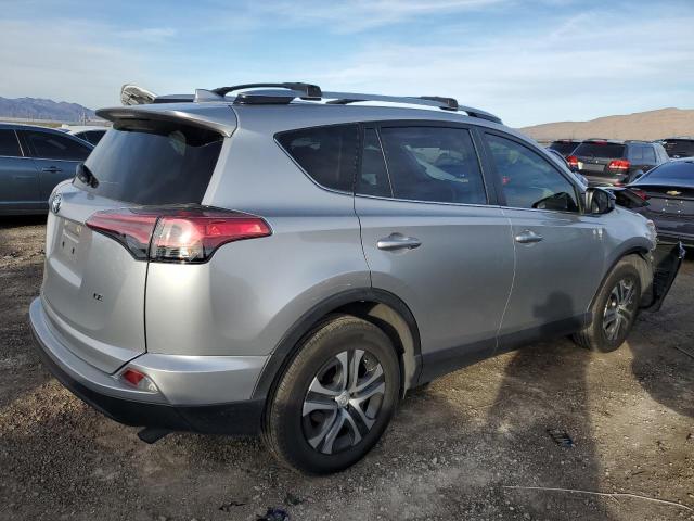 JTMZFREV9JJ181643 - 2018 TOYOTA RAV4 LE SILVER photo 3