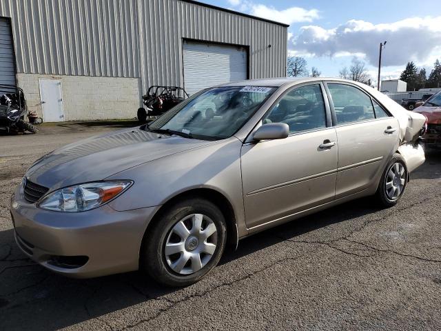 JTDBE32K420028607 - 2002 TOYOTA CAMRY LE GOLD photo 1