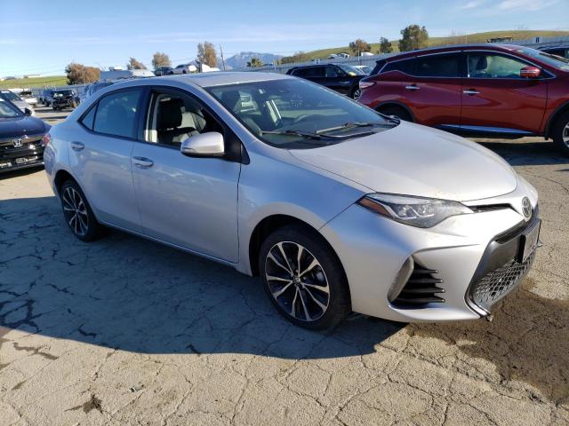 5YFBURHE1HP676668 - 2017 TOYOTA COROLLA L SILVER photo 4