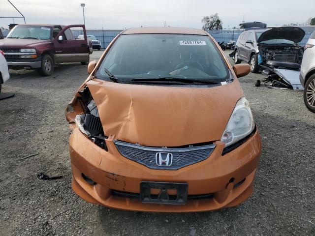 JHMGE88449S058344 - 2009 HONDA FIT SPORT ORANGE photo 5