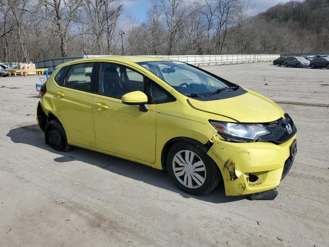 JHMGK5H51GX009635 - 2016 HONDA FIT LX YELLOW photo 4