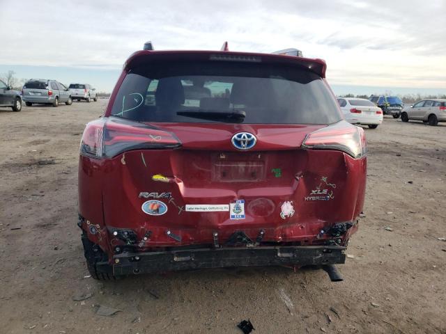 JTMRJREV1JD225955 - 2018 TOYOTA RAV4 HV LE RED photo 6