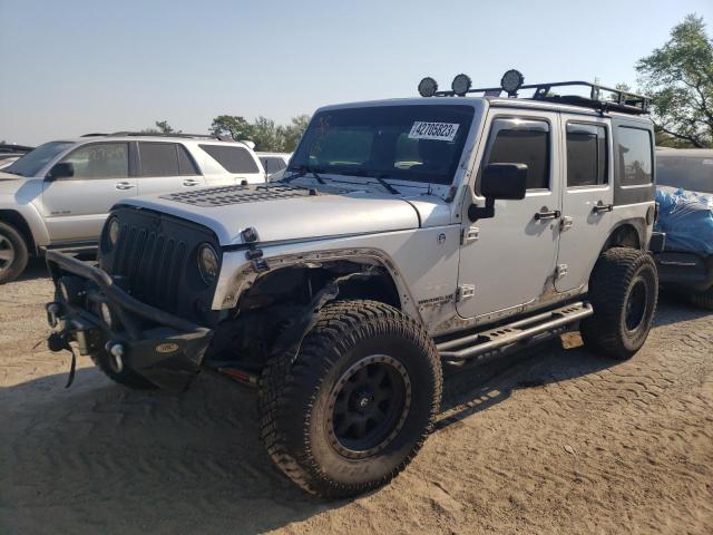 1C4HJWEG9CL219017 - 2012 JEEP WRANGLER U SAHARA SILVER photo 1