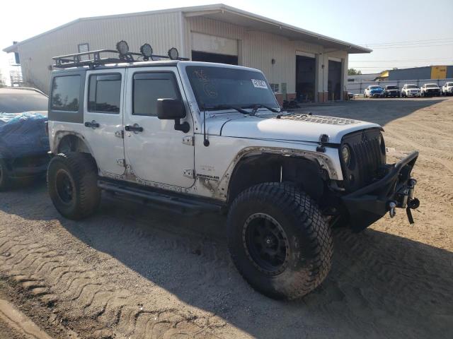 1C4HJWEG9CL219017 - 2012 JEEP WRANGLER U SAHARA SILVER photo 4