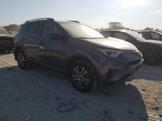 JTMBFREV5JJ179924 - 2018 TOYOTA RAV4 LE GRAY photo 4