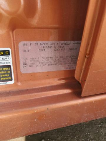 KL1TD52695B404045 - 2005 CHEVROLET AVEO BASE ORANGE photo 13