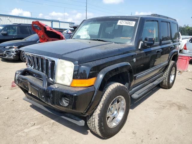 1J8HG48P47C529427 - 2007 JEEP COMMANDER BLACK photo 1