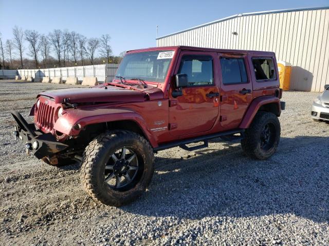 1J4BA5H14BL544187 - 2011 JEEP WRANGLER U SAHARA MAROON photo 1