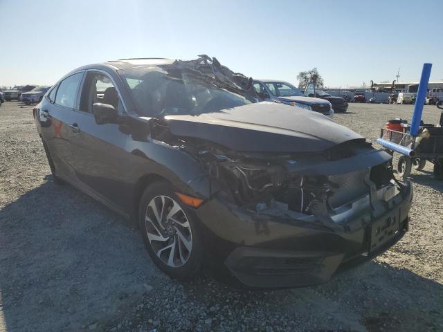 19XFC2F7XGE234911 - 2016 HONDA CIVIC EX BLACK photo 4