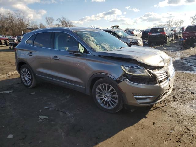 5LMCJ3D90HUL28455 - 2017 LINCOLN MKC RESERVE GRAY photo 4