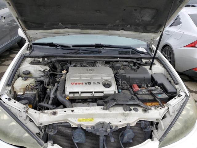 4T1BA30K55U507447 - 2005 TOYOTA CAMRY SE WHITE photo 11