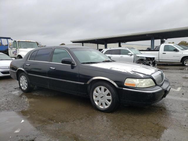 1LNHM84W05Y607900 - 2005 LINCOLN TOWN CAR EXECUTIVE L BLACK photo 4