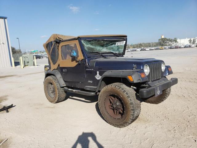 1J4FY29P2VP414789 - 1997 JEEP WRANGLER / SE BLUE photo 4