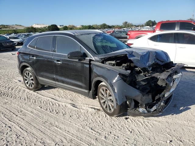 5LMCJ3C95KUL08033 - 2019 LINCOLN MKC RESERVE BLACK photo 4