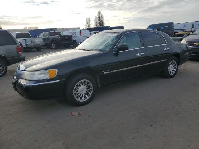 1LNHM82W2YY914590 - 2000 LINCOLN TOWN CAR SIGNATURE BLACK photo 1