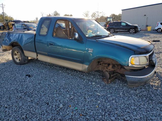 1FTRX17W7YKA64927 - 2000 FORD F150 TEAL photo 4