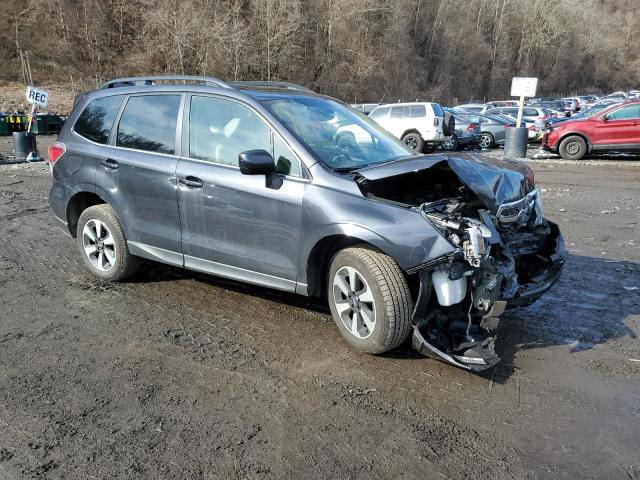 JF2SJARC1JH556766 - 2018 SUBARU FORESTER 2.5I LIMITED BLACK photo 4