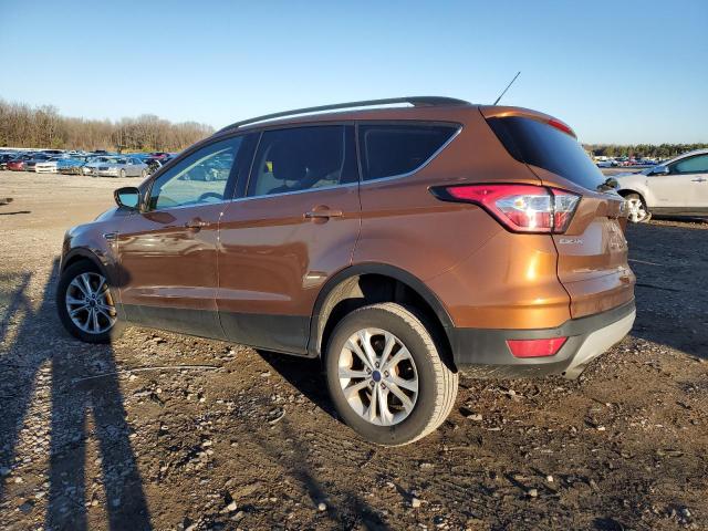 1FMCU9G99HUC62061 - 2017 FORD ESCAPE SE ORANGE photo 2