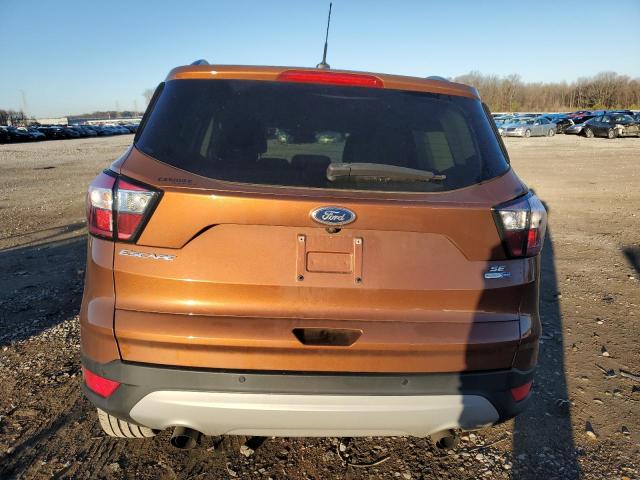 1FMCU9G99HUC62061 - 2017 FORD ESCAPE SE ORANGE photo 6