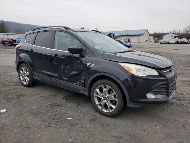 1FMCU9GX0GUC33576 - 2016 FORD ESCAPE SE BLACK photo 4