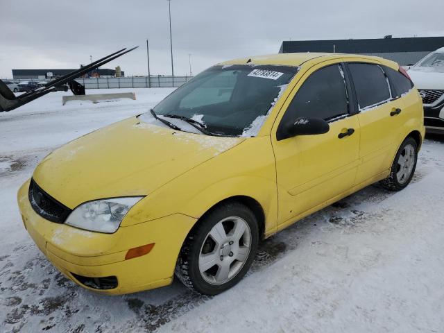 3FAFP37N75R144909 - 2005 FORD FOCUS ZX5 YELLOW photo 1