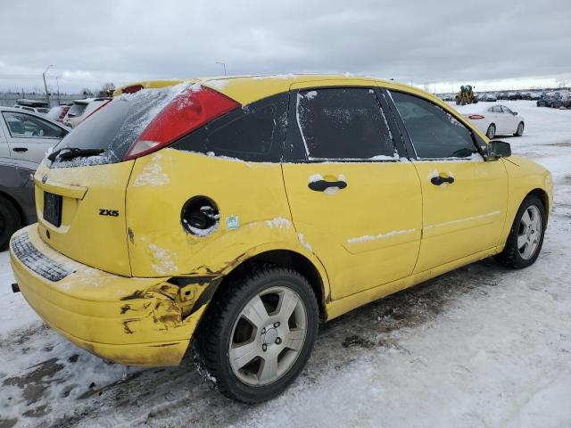 3FAFP37N75R144909 - 2005 FORD FOCUS ZX5 YELLOW photo 3