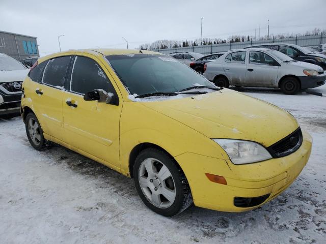 3FAFP37N75R144909 - 2005 FORD FOCUS ZX5 YELLOW photo 4